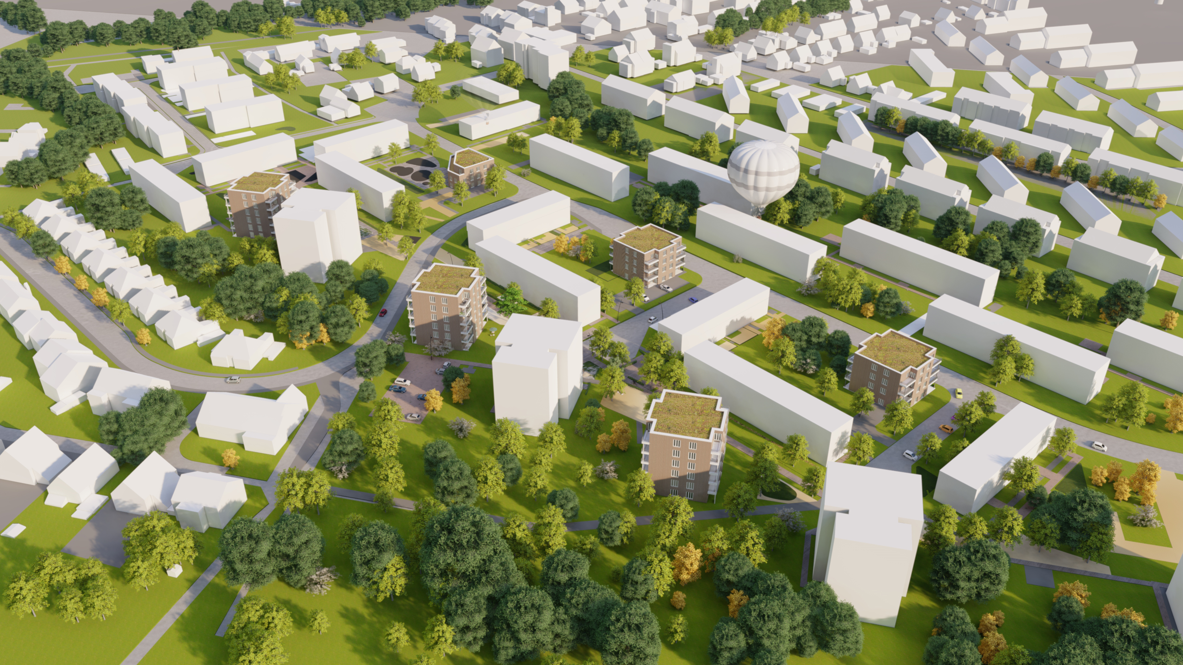 In der Luftbild-Visualisierung sind viele Häuser, darunter 6 hervorgehobene braune Häuser für das Projekt zu sehen. Zudem viele Grünflächen, Bäume und Parkplätze.