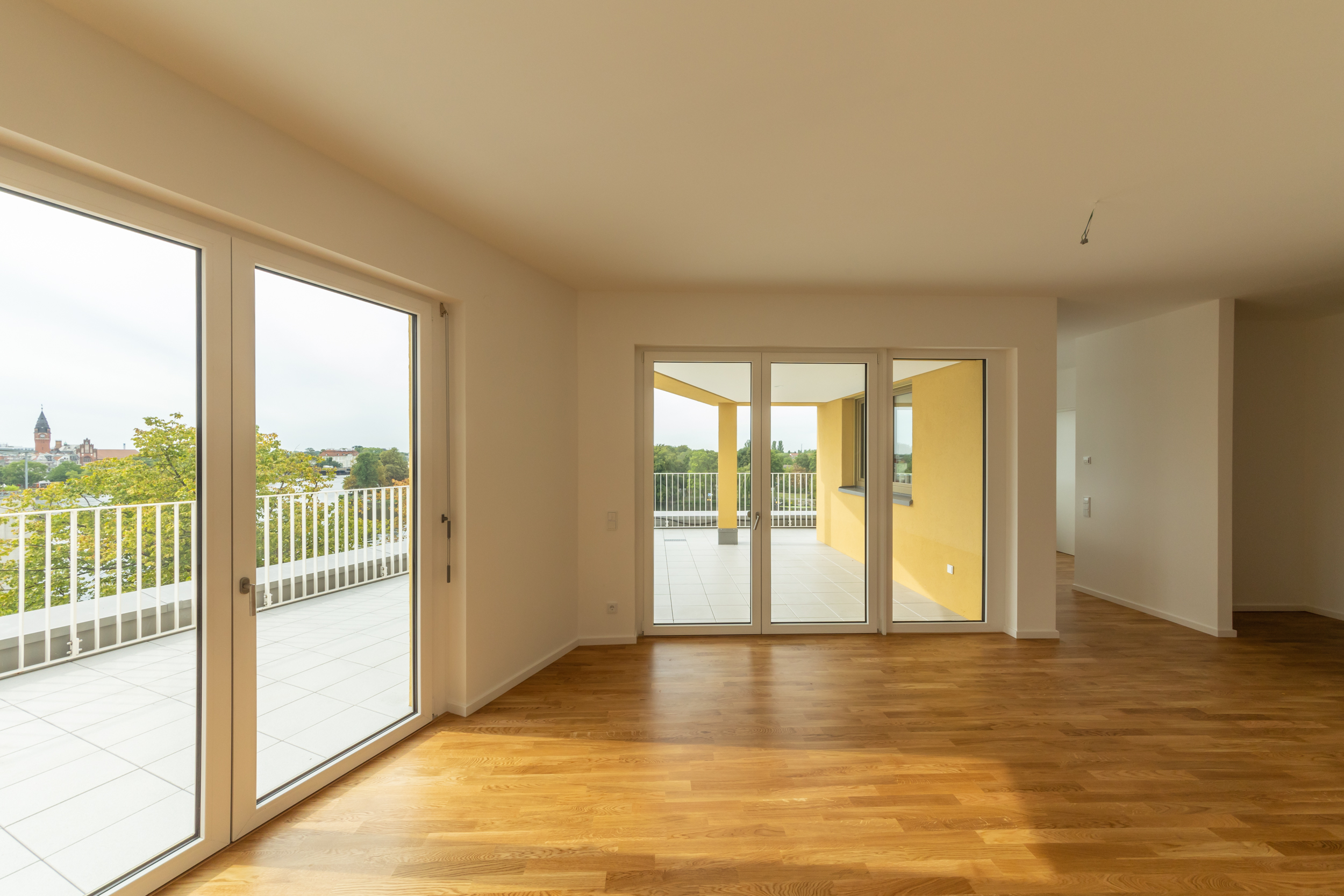 Ansicht einer Wohnung mit Terrasse des Neubauprojekts BUWOG Uferkrone Suno