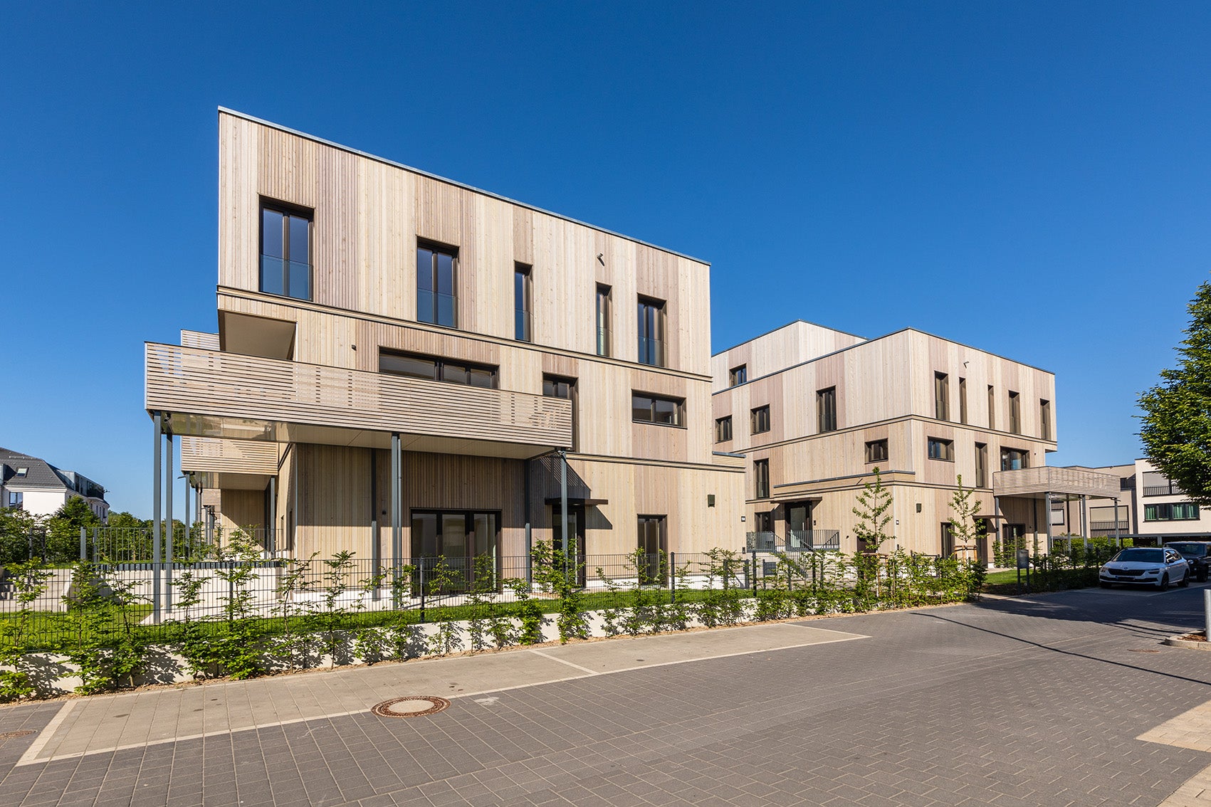 BUWOG Lotsenhäuser timber construction project in Berlin's 52 Grad Nord quarter with a view from the street